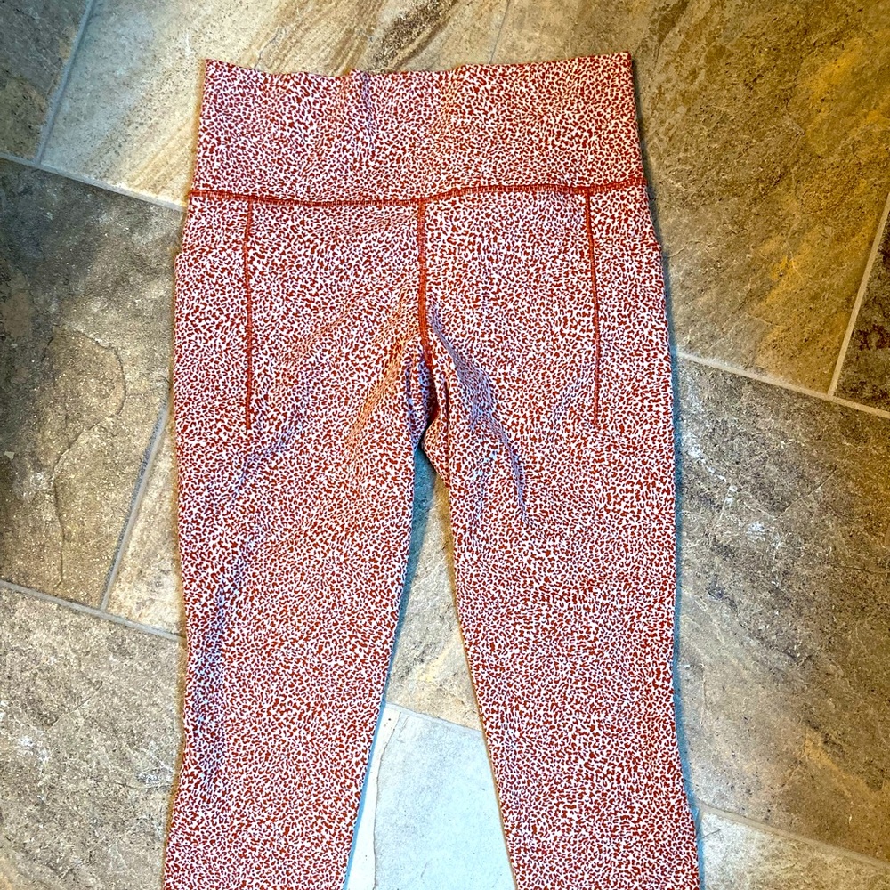 Athleta Saluatation stash II, textured tights 7/8
